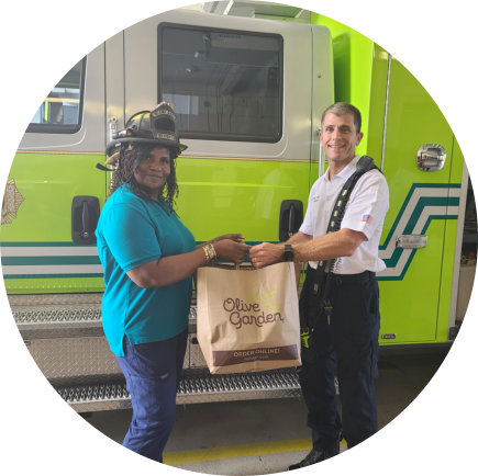 man giving a bag to a woman